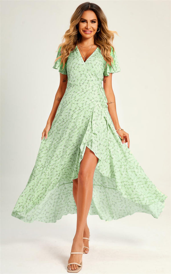 Zomerse midi-jurk met bloemenprint en zoom in mintgroen