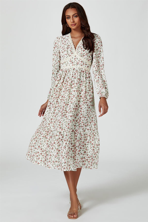 Midi-jurk met lange mouwen en bloemenprint in het wit