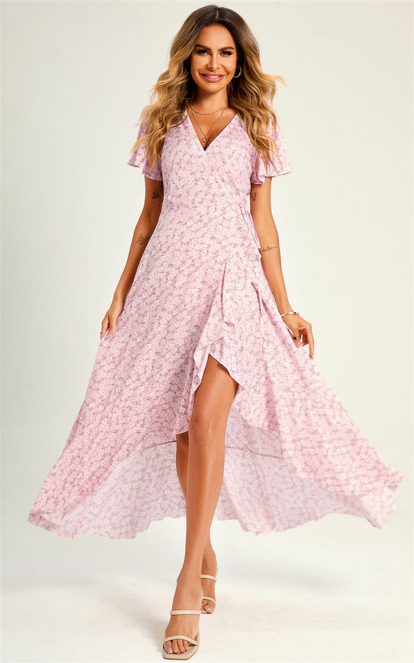 Zomerse midi-jurk met bloemenprint en zoom in roze