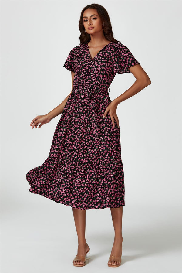 Roze midi-jurk met bloemenprint in zwart