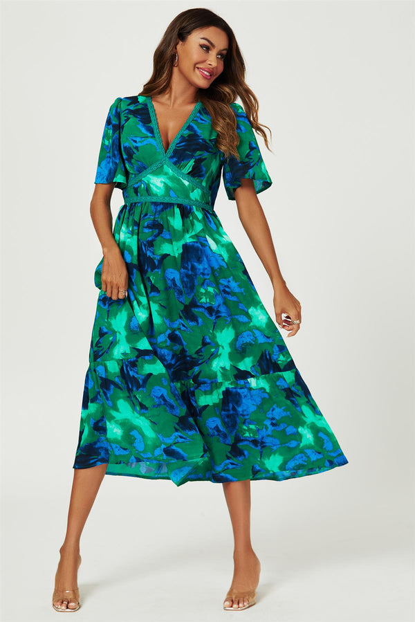 Maxi-jurk met abstracte bloemenprint, kantdetail en engelmouwen in groen