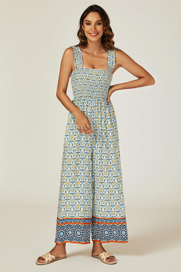 Dehnbarer, gesmokter Jumpsuit mit weitem Bein und Geo-Print in Blau