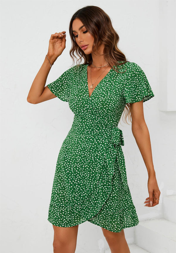 Mini wikkeljurk met bloemenprint in groen