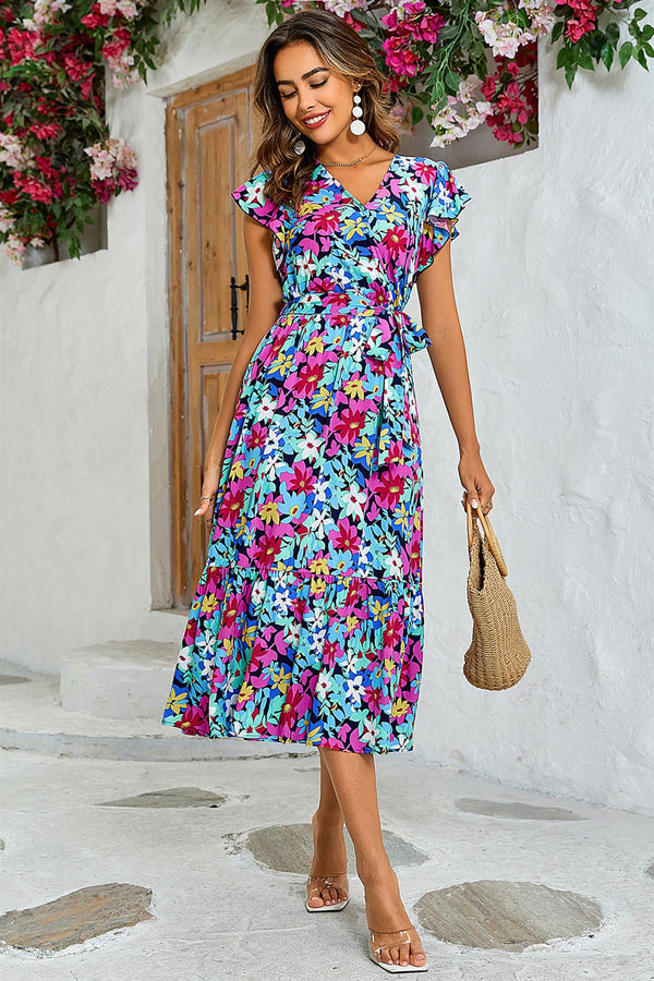 Wikkeljurk met veelkleurige bloemenprint in marineblauw