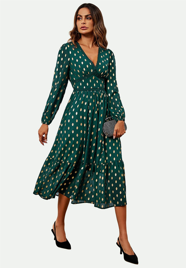 Lange maxi-jurk met kanten rand en folie in groen