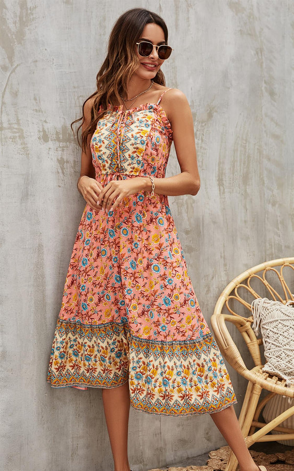 Blauwe en gele bloemen midi-jurk met bandjes en knoopjes aan de voorkant in het rood